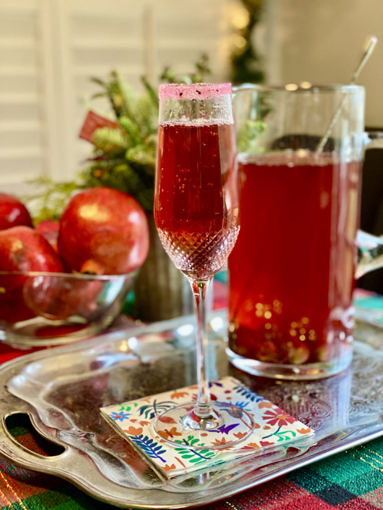 Find the recipe for MyNewUsual's favorite holiday sparkler, Pomegranate Prosecco Punch at www.mynewusual.com.